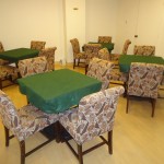The poker room spreads out several tables