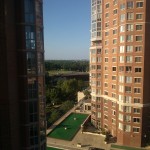 The view of a Carlyle Towers condo facing towards DC during the day