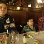 Father, son and brother at the dinner table
