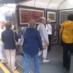 People view the artwork at the Reston Town Center
