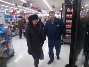 Will Nesbitt and Julie Nesbitt going through Wal-Mart